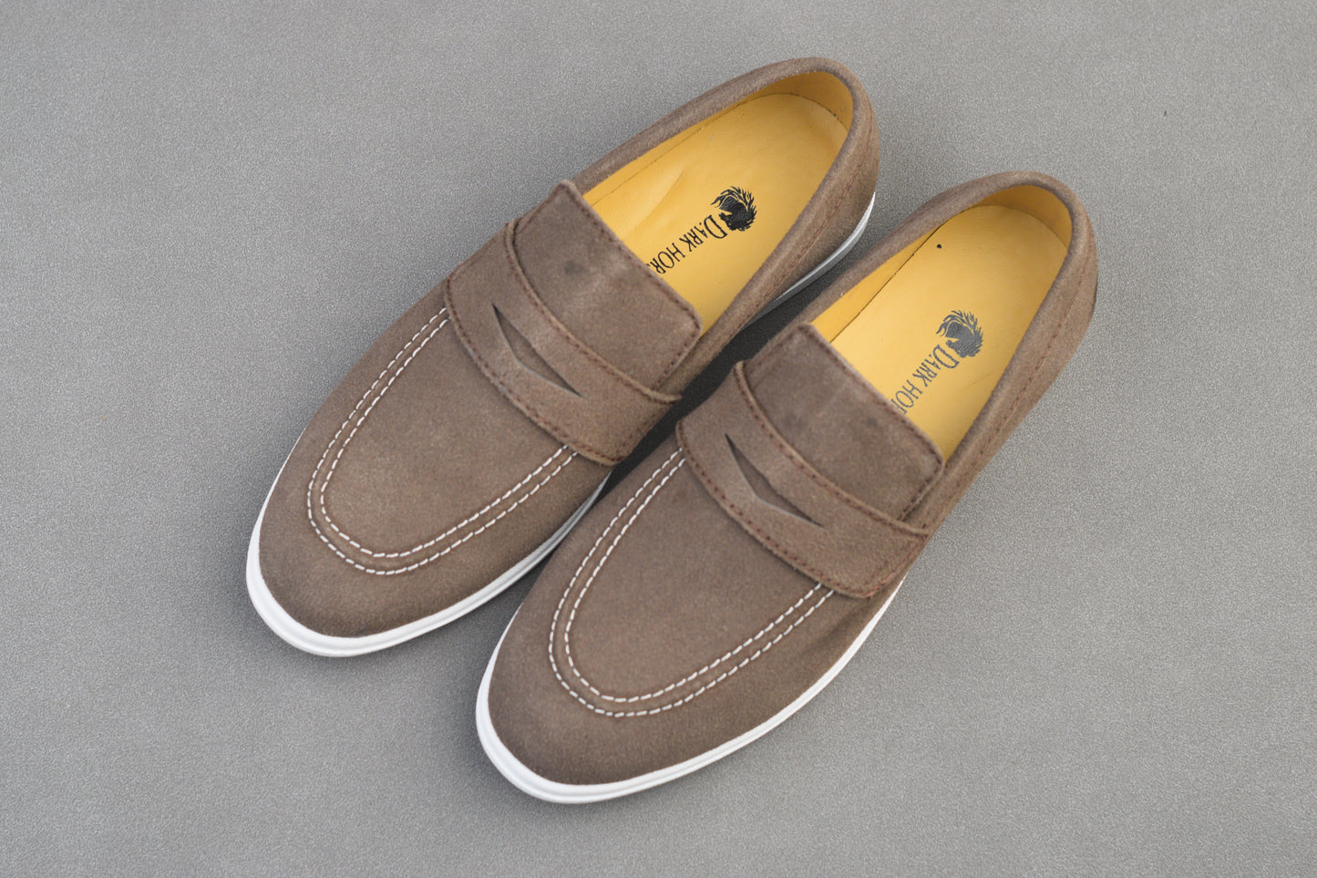 BROWN SUEDE WHITE SOLE MOCCAINS