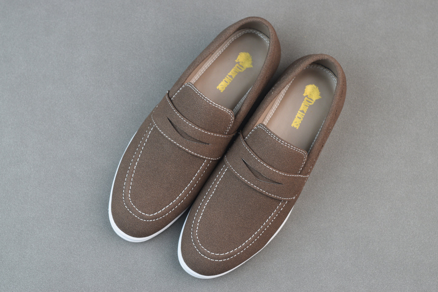 BROWN SUEDE WHITE SOLE MOCCAINS
